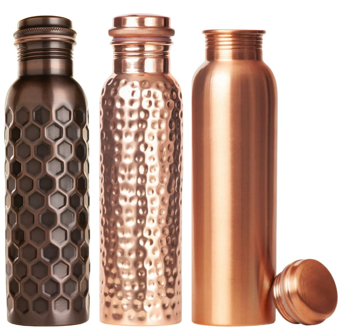 Three copper water bottles with a white box labeled 'Otem' on a white background